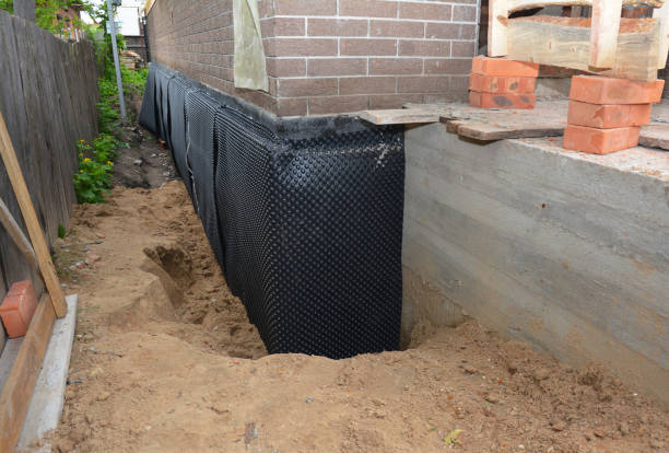 Happy homeowners after waterproofing job in Melville